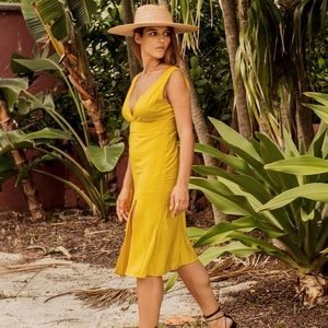 Yellow midi dress with slit